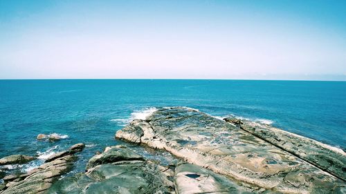 Scenic view of sea against clear sky