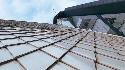 Low angle view of modern building against sky