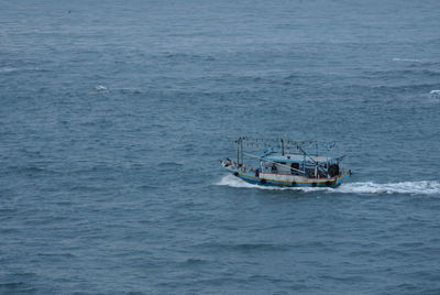 High angle view of fishing boat in sea