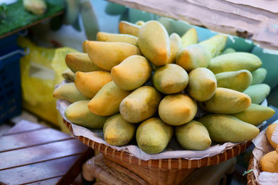 High angle view of fruits in basket for sale