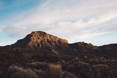 Scenic view of rocky mountains against sky