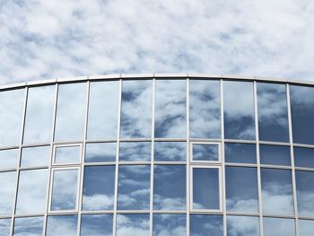Reflection of sky on modern building