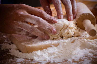 Close-up of person preparing food