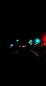 Illuminated street lights at night