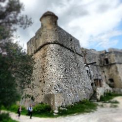 Low angle view of old building against sky