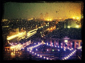 Illuminated cityscape at night