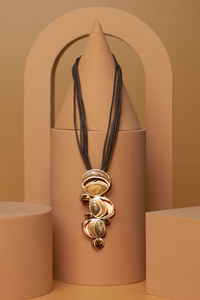 Close-up of key ring on red background