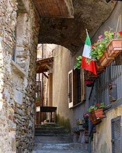 Low angle view of residential building with italian flag