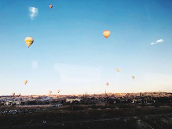 Hot air balloons flying in sky