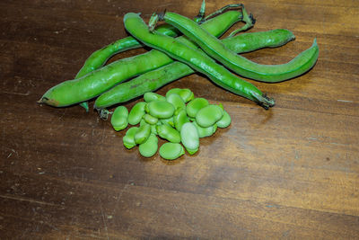 High angle view of green chili pepper on table