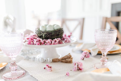 Close up of cherry blossom easter dining tablescape