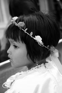 Close-up portrait of girl wearing tiara