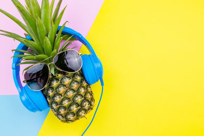 High angle view of fruit against blue background