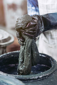 Close-up of rope tied on metal sculpture