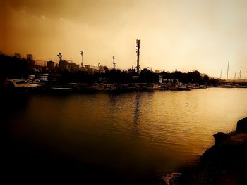 Silhouette of harbor at sunset