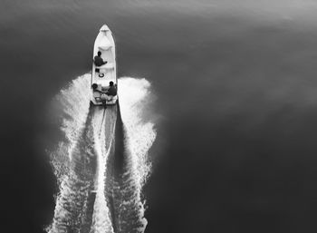 High angle view of people boating on sea