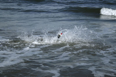 Scenic view of waves in sea