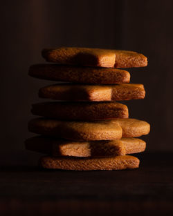 Close-up of stacked coins on table