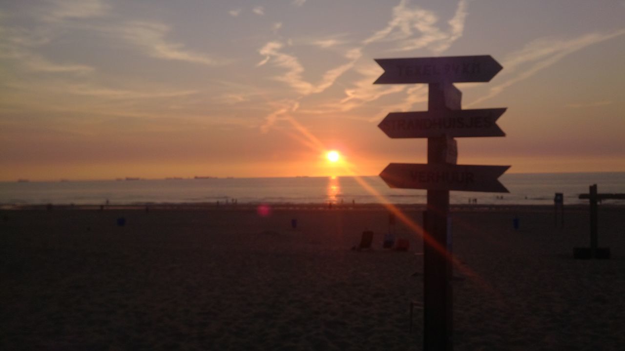 LIFEGUARD HUT ON BEACH DURING SUNSET