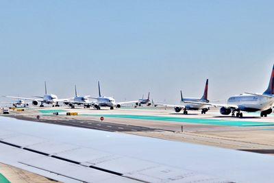 View of airport runway against sky