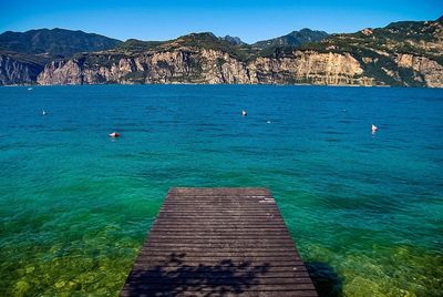 Scenic view of sea against blue sky