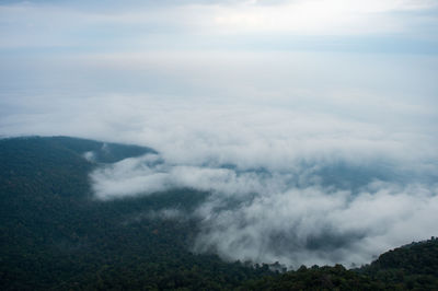 Scenic view of clouds over landscape against sky