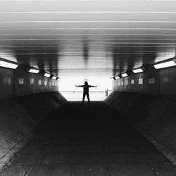 Full length of woman in tunnel