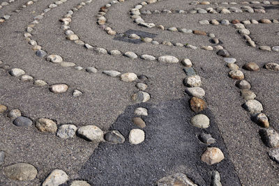 Traditional maze made of stones and asphalt
