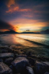 Scenic view of sea against sky during sunset