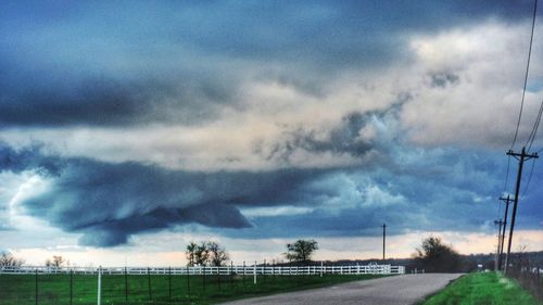 Road against cloudy sky