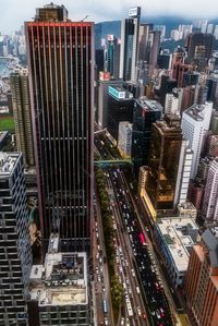 High angle view of modern buildings in city against sky