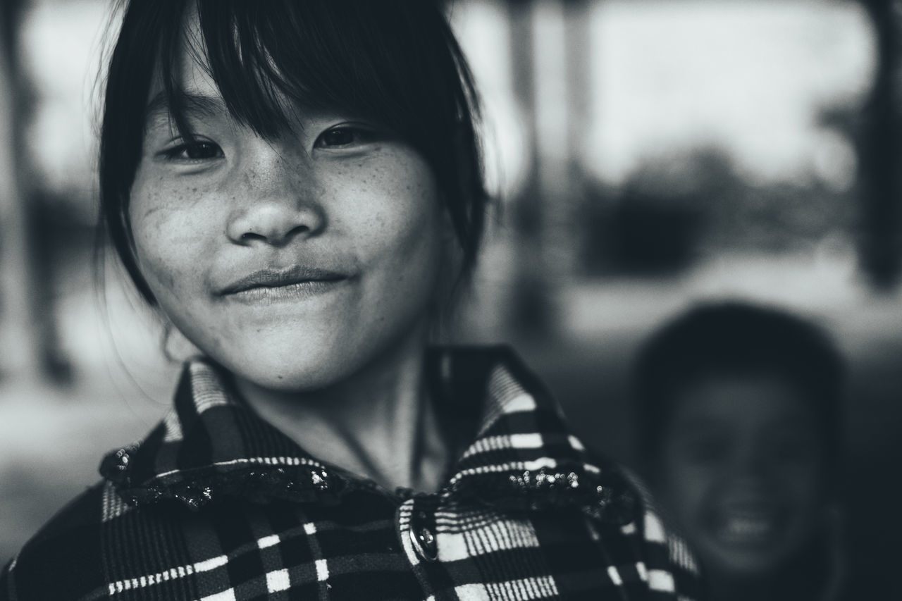 portrait, headshot, looking at camera, child, real people, childhood, smiling, focus on foreground, front view, lifestyles, emotion, happiness, close-up, boys, men, people, women, females, innocence, human face