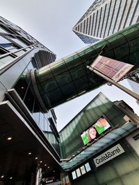 Low angle view of modern building against sky