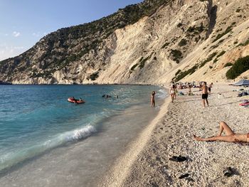 People laying on the beach 