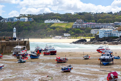 Scenic view of sea and buildings against sky