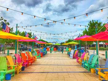 Multi colored lanterns hanging against sky