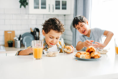 High angle view of people and food on table