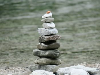 Close-up of stack of pebbles on rocks