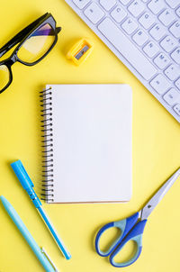 High angle view of office supplies on table