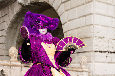 Woman with purple umbrella
