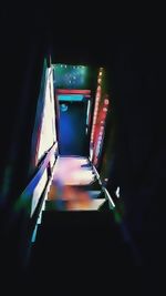 Low angle view of illuminated building at night