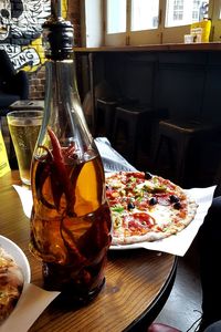 Close-up of pizza on table in restaurant