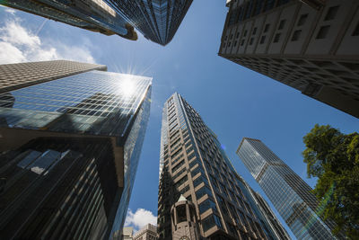 Low angle view of skyscrapers in the financial district of hong kong