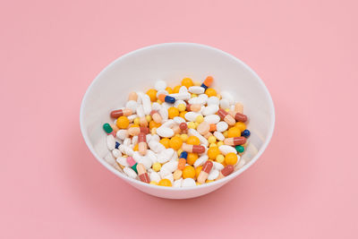 High angle view of multi colored candies in bowl