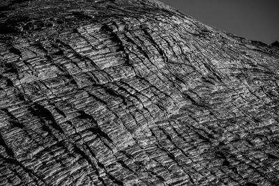 Low angle view of rock formation against sky