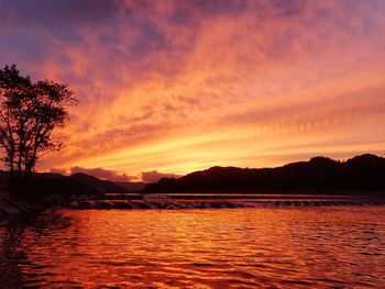 View of calm sea at sunset