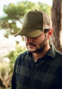 Portrait of young man wearing hat