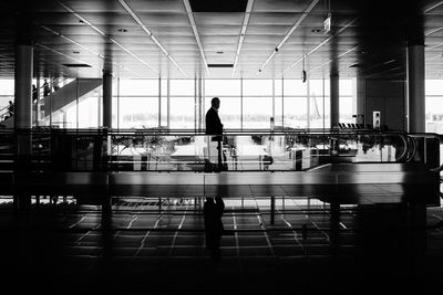 Man walking at airport runway