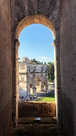 Buildings seen through arch window