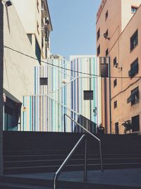 Low angle view of stairs against clear sky